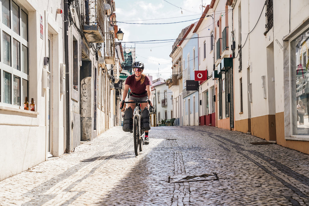 Buoy Bags seen on a gravel bike on cobble stone streets in Grey Cordura