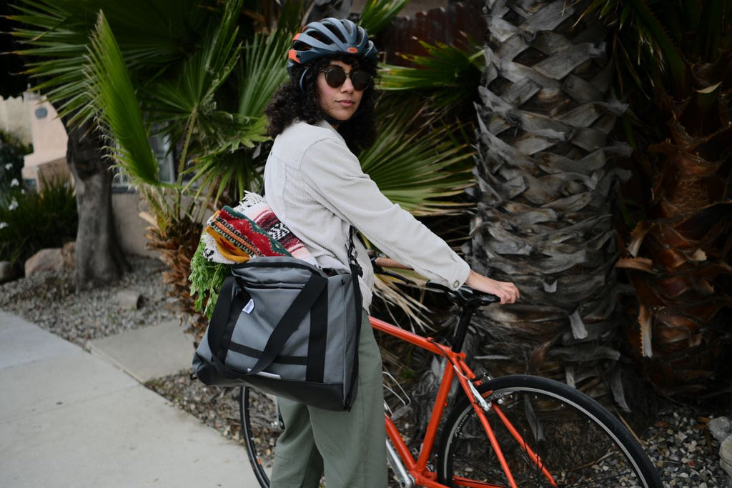 Grey Everything Tote Bag shown on a female rider.