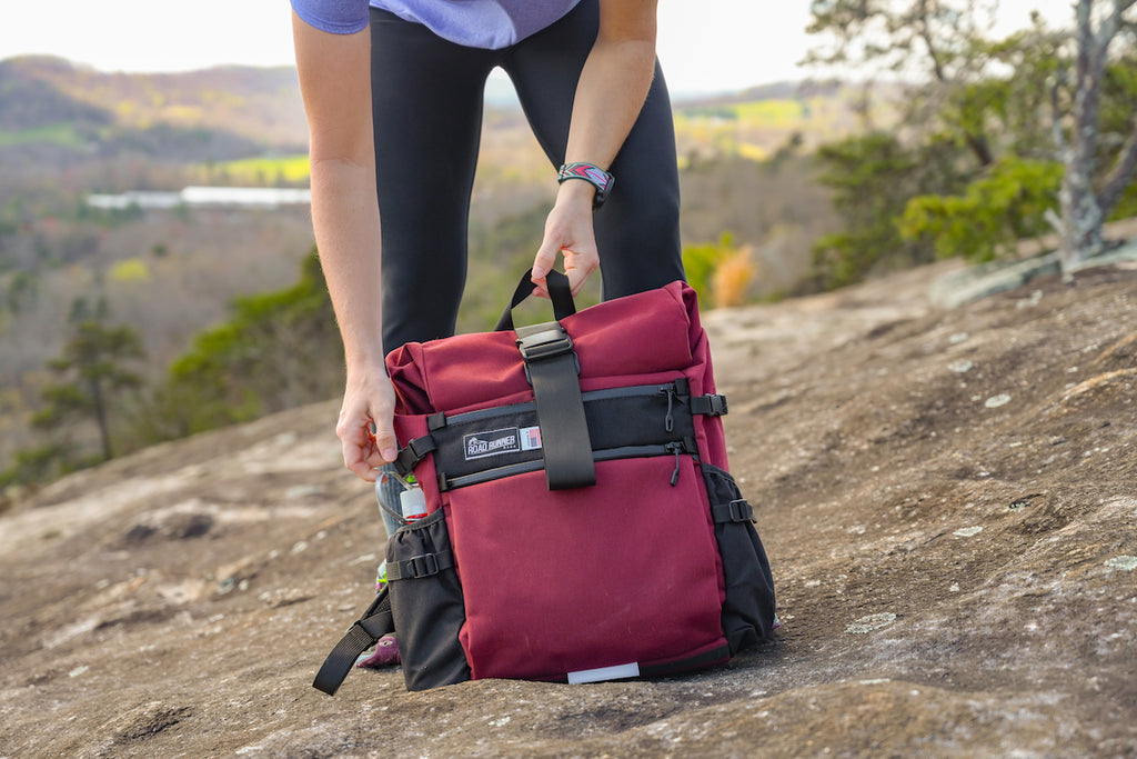 Medium Roll Top in the Woods seen in Burgundy Cordura.